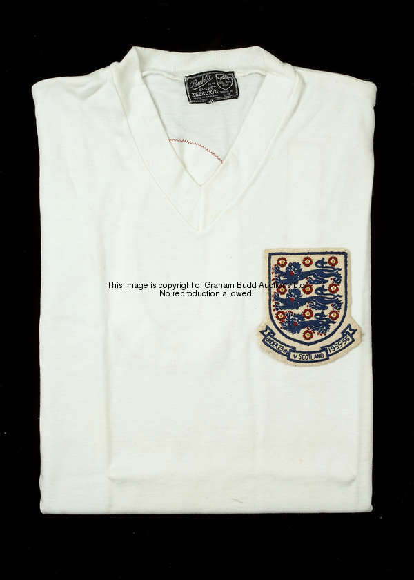 Johnny Haynes: a white England No.10 under-23 international jersey, short-sleeved, v-neck collar, em...