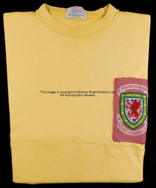 Gary Sprake's match-worn yellow Wales international goalkeeping jersey from the East Germany game in...