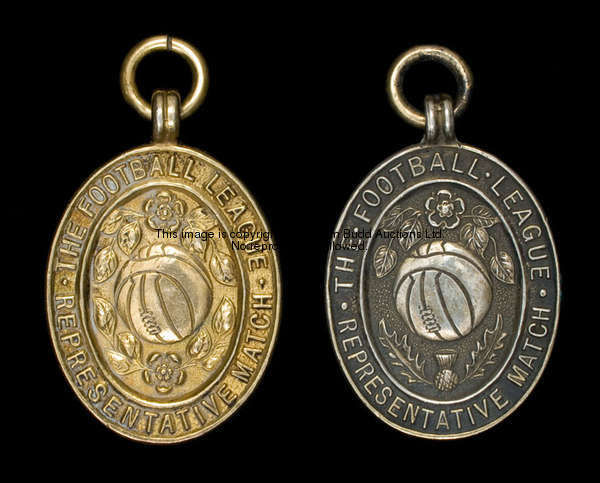 A silver-gilt Football League representative medal, the reverse inscribed THE FOOTBALL LEAGUE  VERSU...