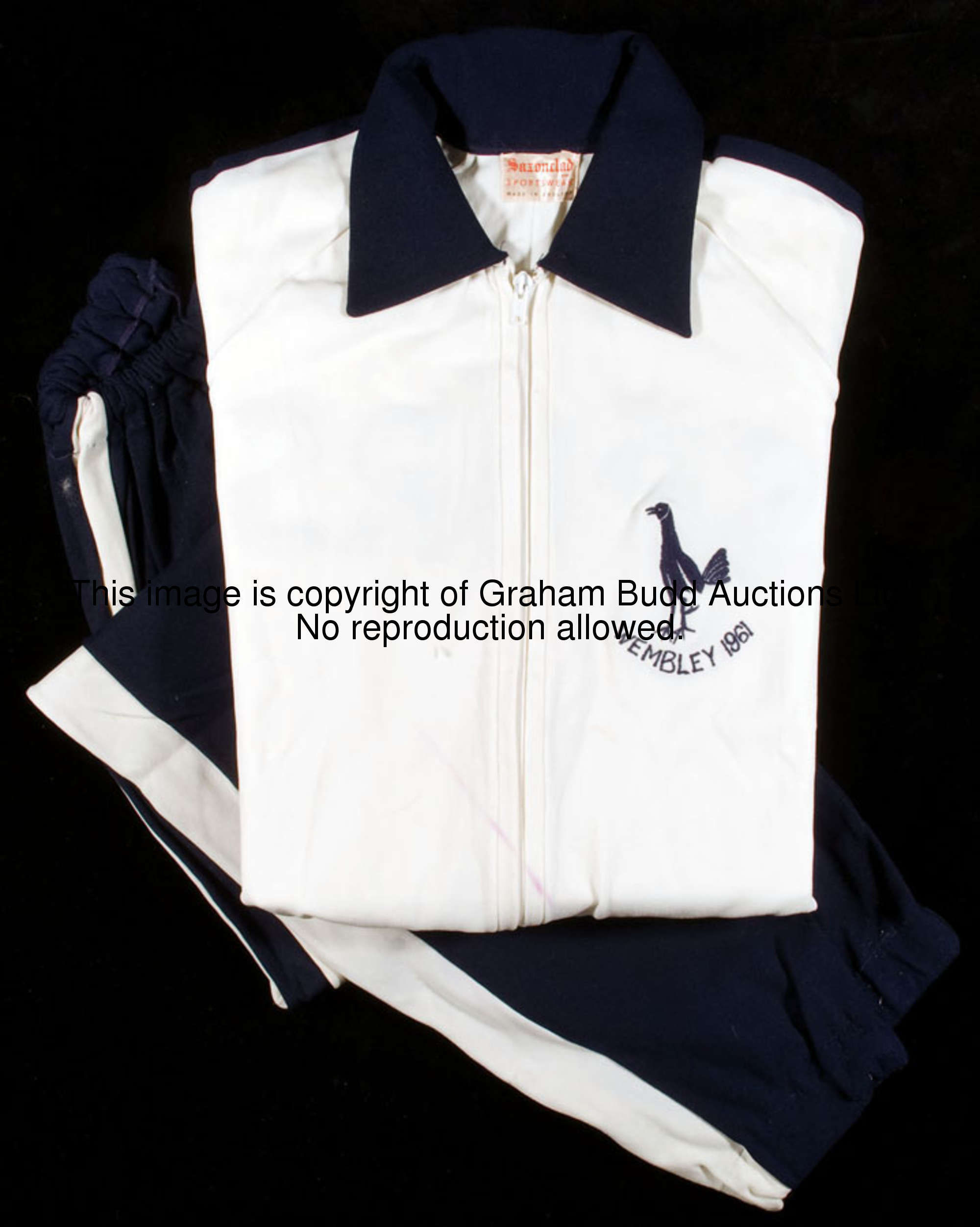 Maurice Norman's 1961 F.A. Cup final Tottenham Hotspur tracksuit, the white zip-up top with blue pip...