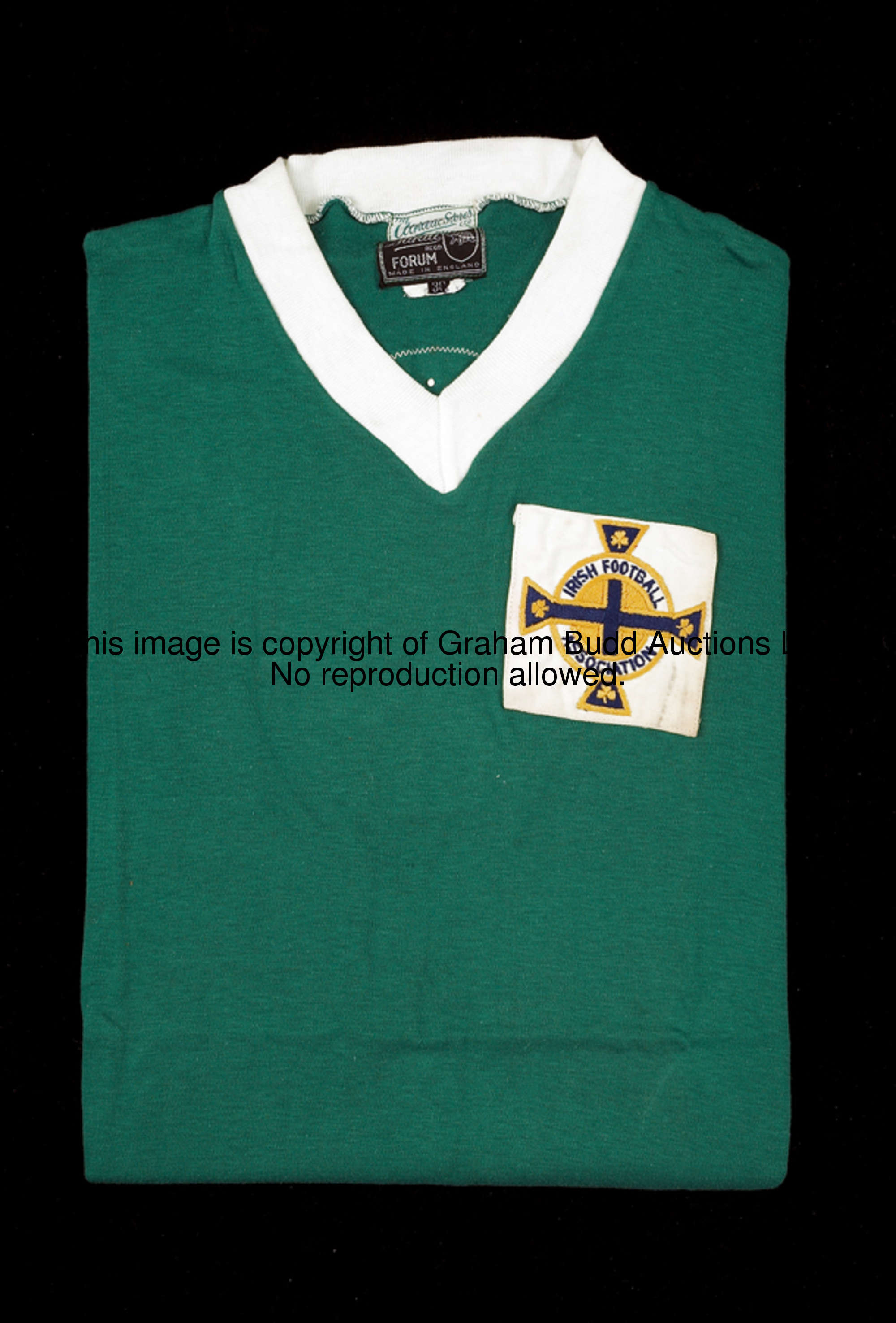 Sammy Wilson: a green Northern Ireland No.9 international jersey, short-sleeved, white v-neck collar...