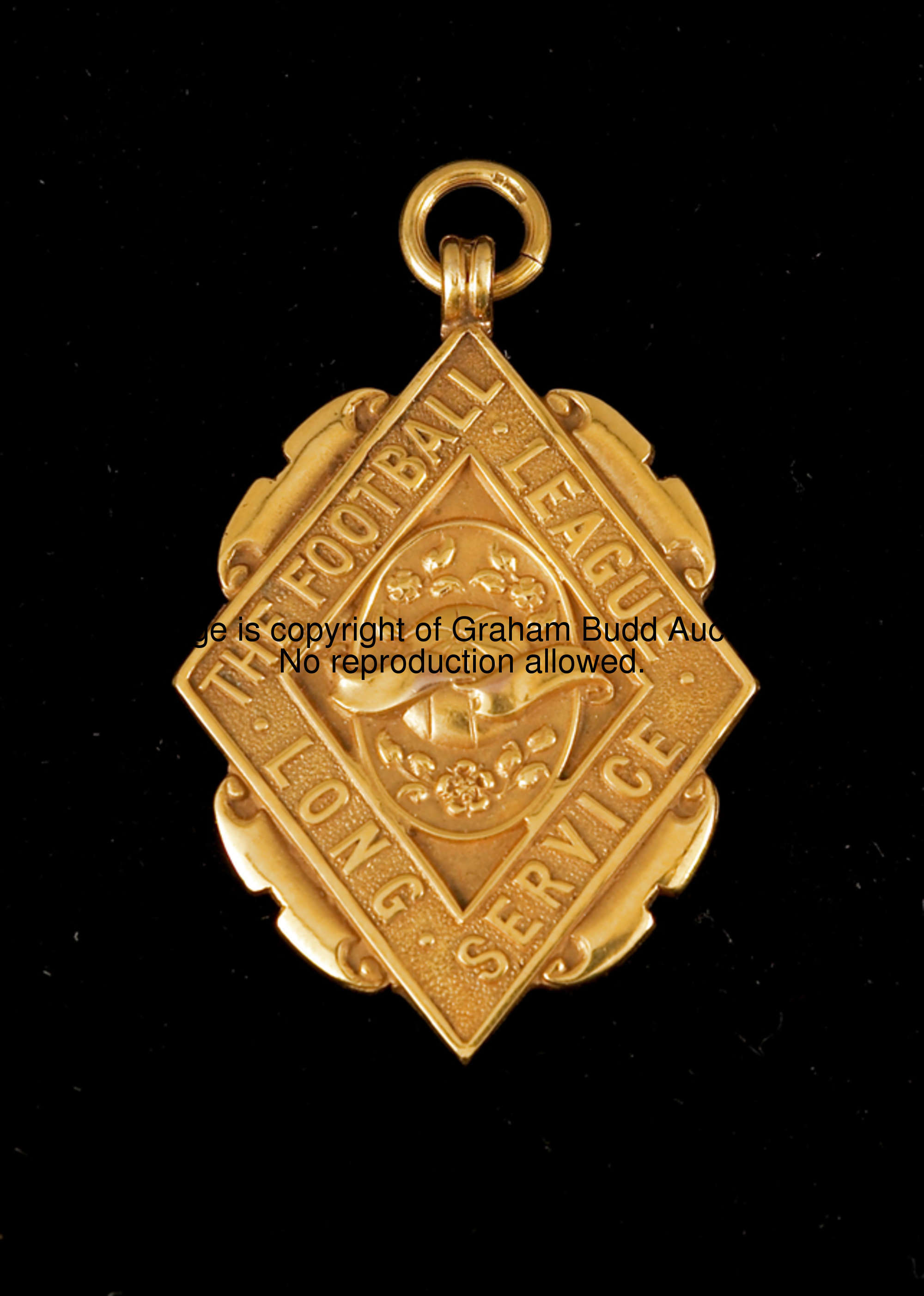 A 9ct. gold Football League long service medal, inscribed THE FOOTBALL LEAGUE, LONG SERVICE, W. ANDE...