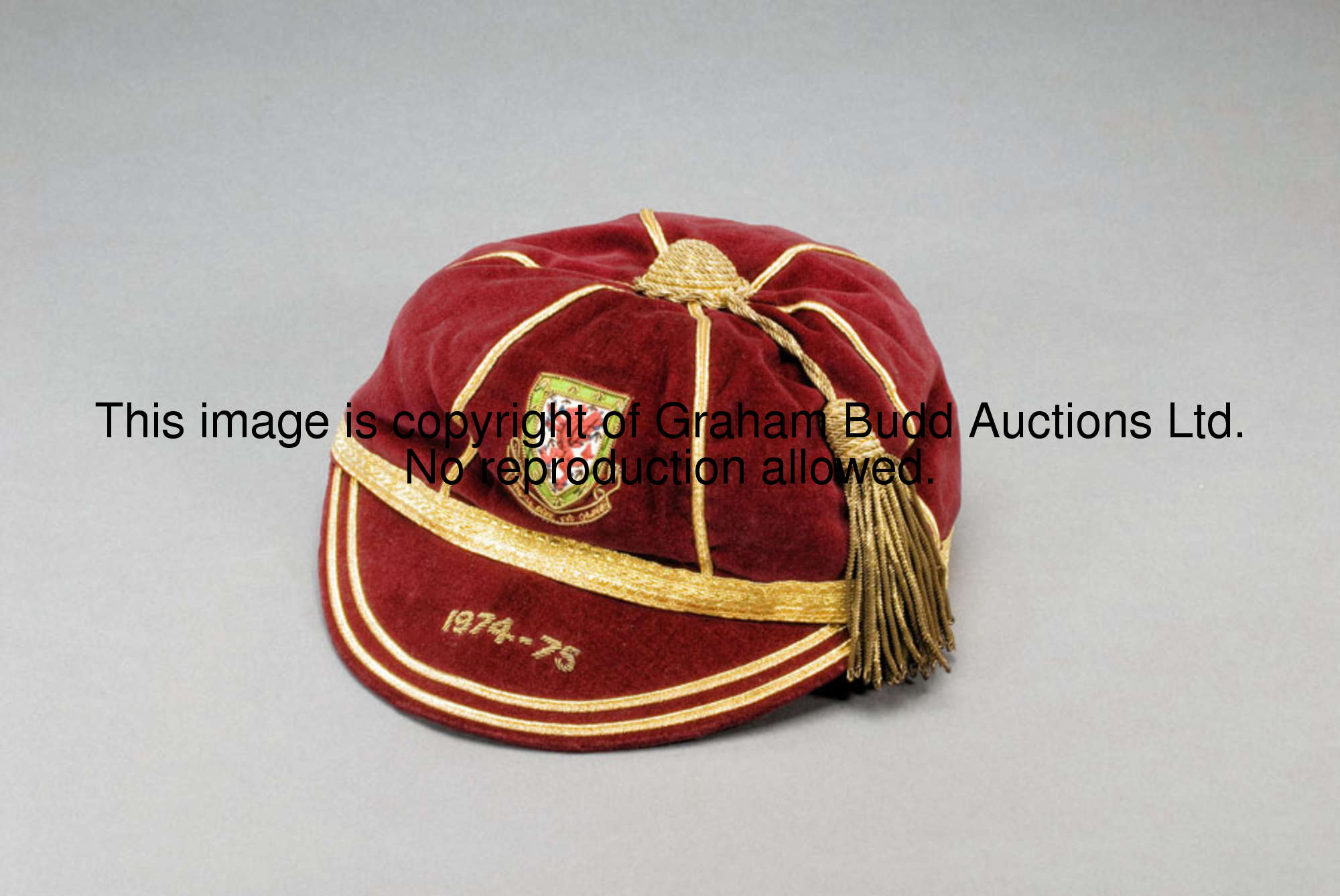 Gary Sprake's red Wales international cap season 1974-75, the inside label marked G. SPRAKE; sold wi...