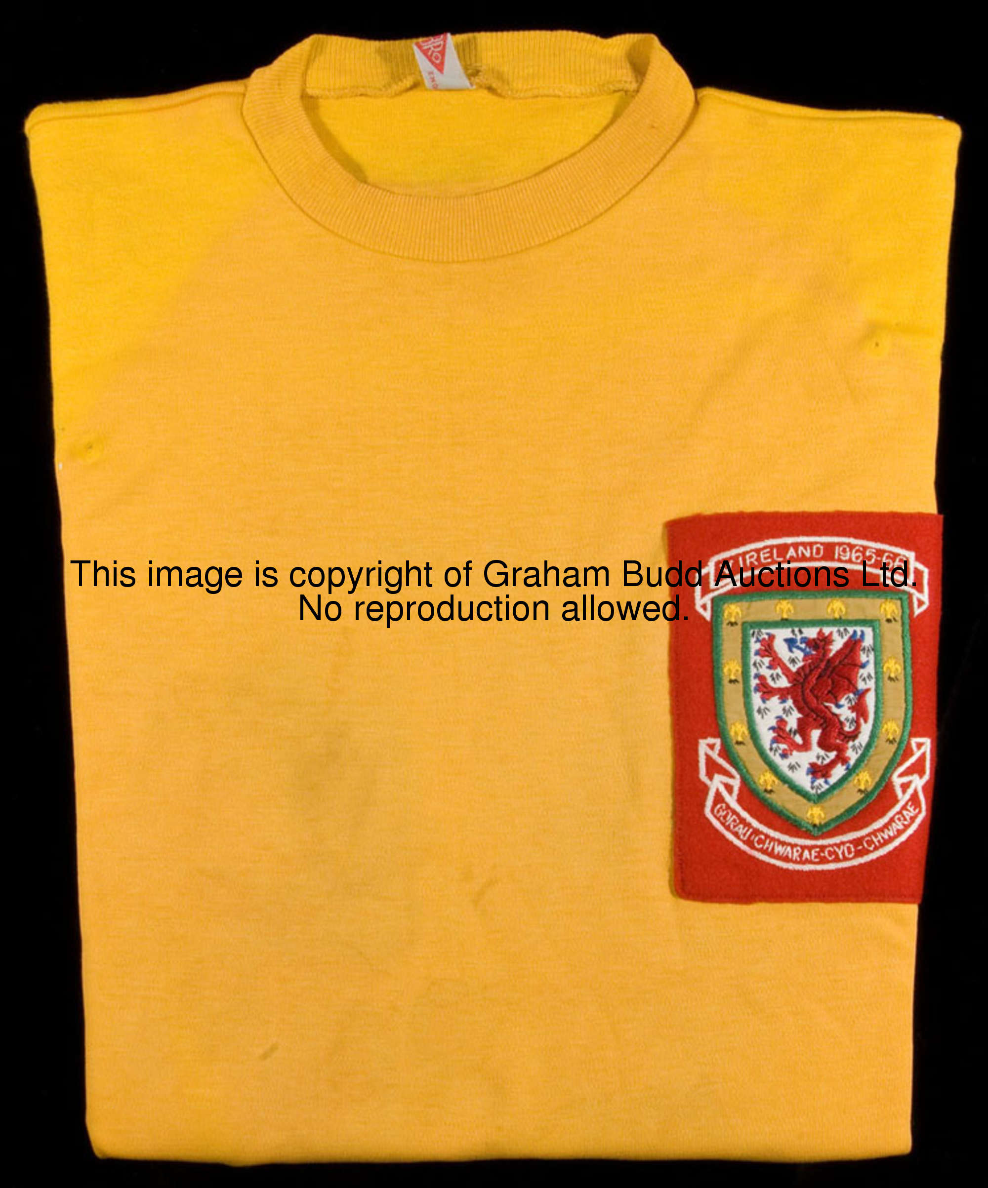 Gary Sprake's match-worn amber Wales international goalkeeping jersey from the Northern Ireland game...