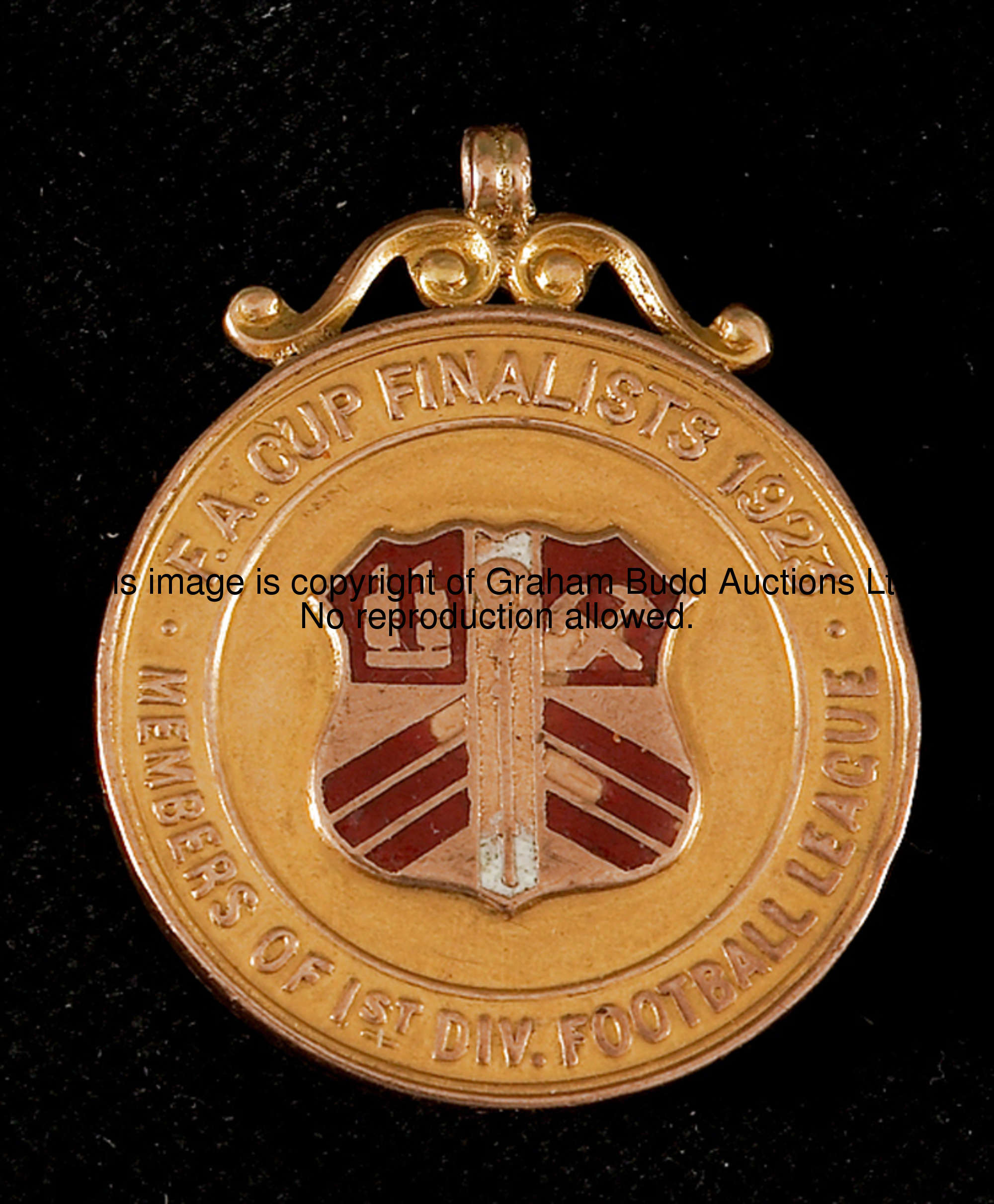 A 9ct. gold & enamel West Ham United medal commemorating their promotion to Division One and their F...