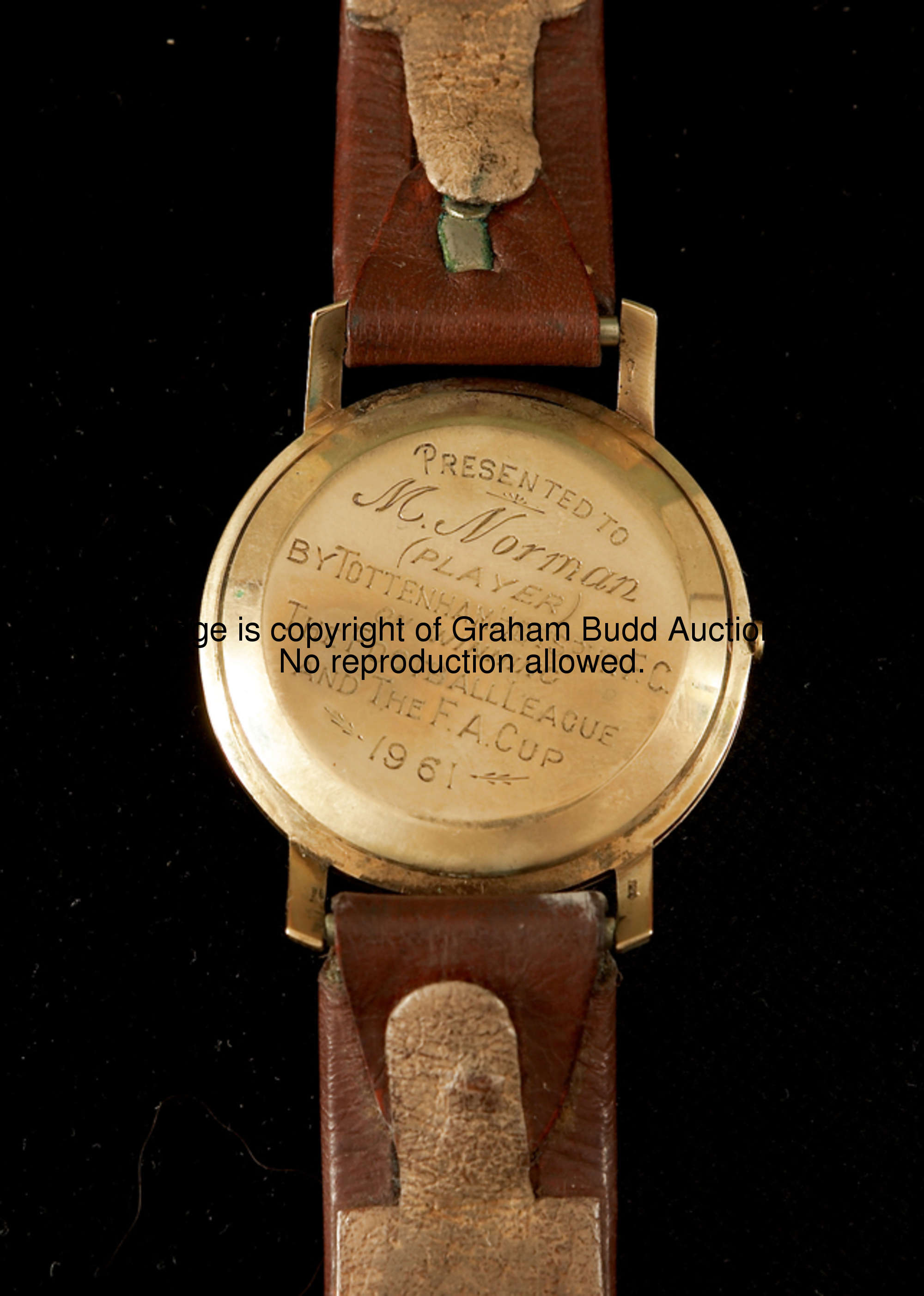 A wristwatch presented to Maurice Norman by Tottenham Hotspur FC to commemorate the 1960-61 double-w...