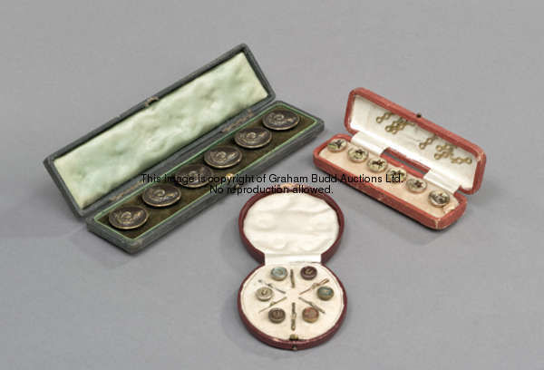 Three cased sets of old hunting buttons, six metal buttons with foxes heads, six in pink & grey deco...