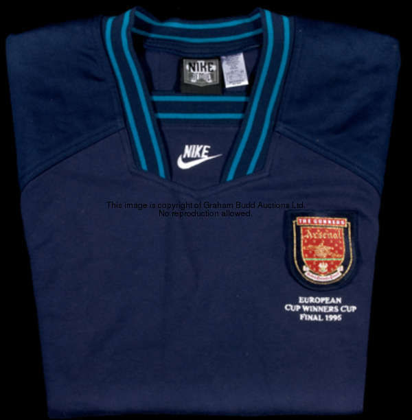 Tony Adams's blue 1995 European Cup Winners' Cup final warm-up top, with embroidered club crest and ...