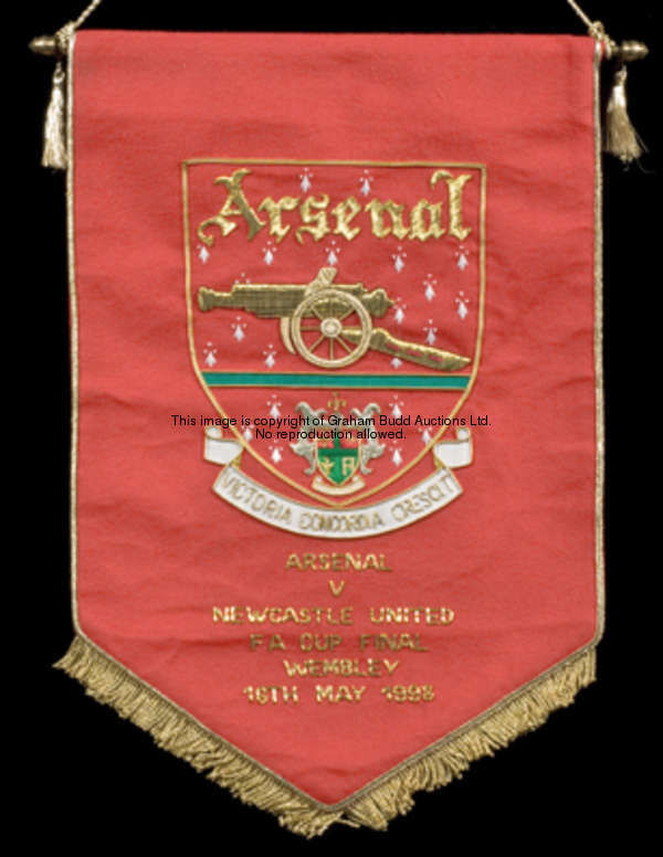 An official Arsenal FC pennant for the 1998 F.A. Cup final, gold and silver wire work on a red groun...