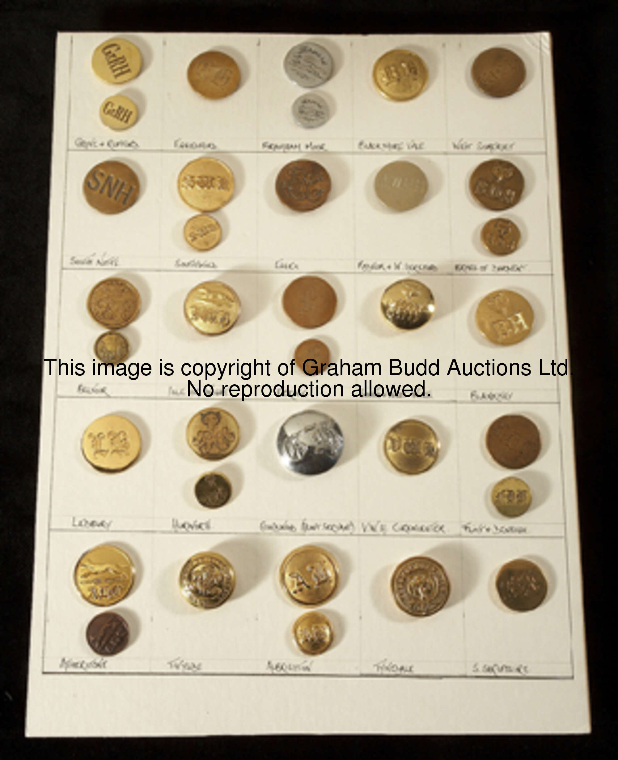 A card of 35 gilt-metal hunt buttons, representation of the Grove & Rufford, Eggesford, Bramham Moor...