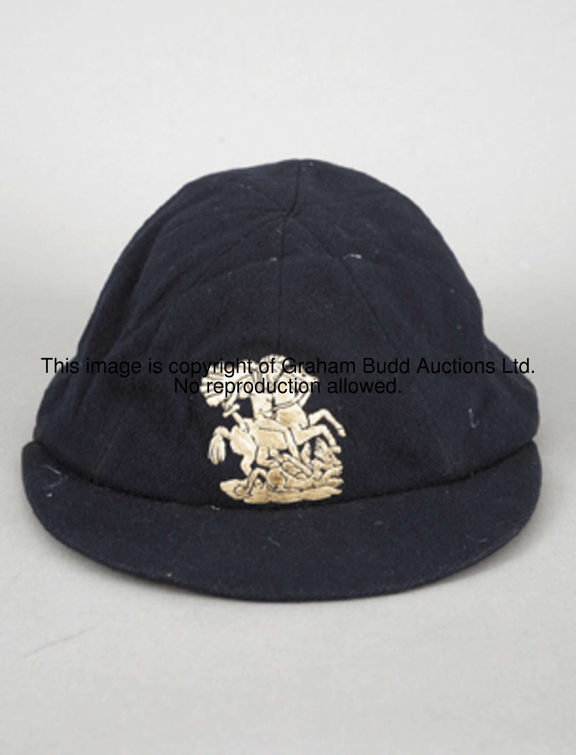 Adam Powell's blue MCC touring cap from the 1935-36 Tour to England and New Zealand, George & the Dr...