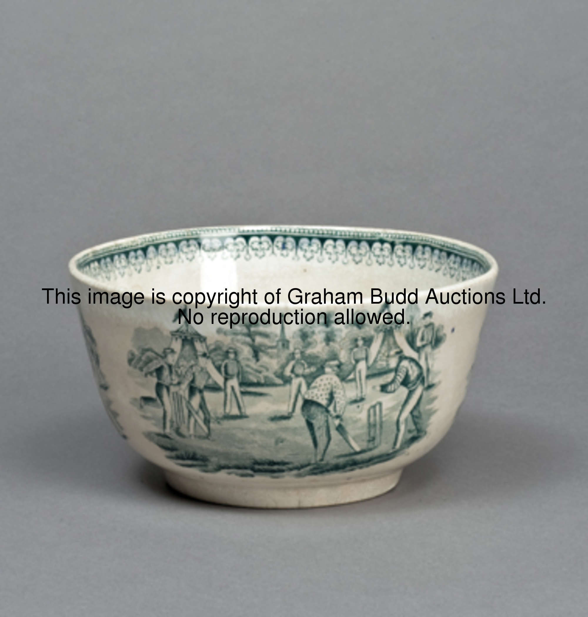 A Victorian Staffordshire bowl, printed in green with two designs of a cricket match with tents and ...