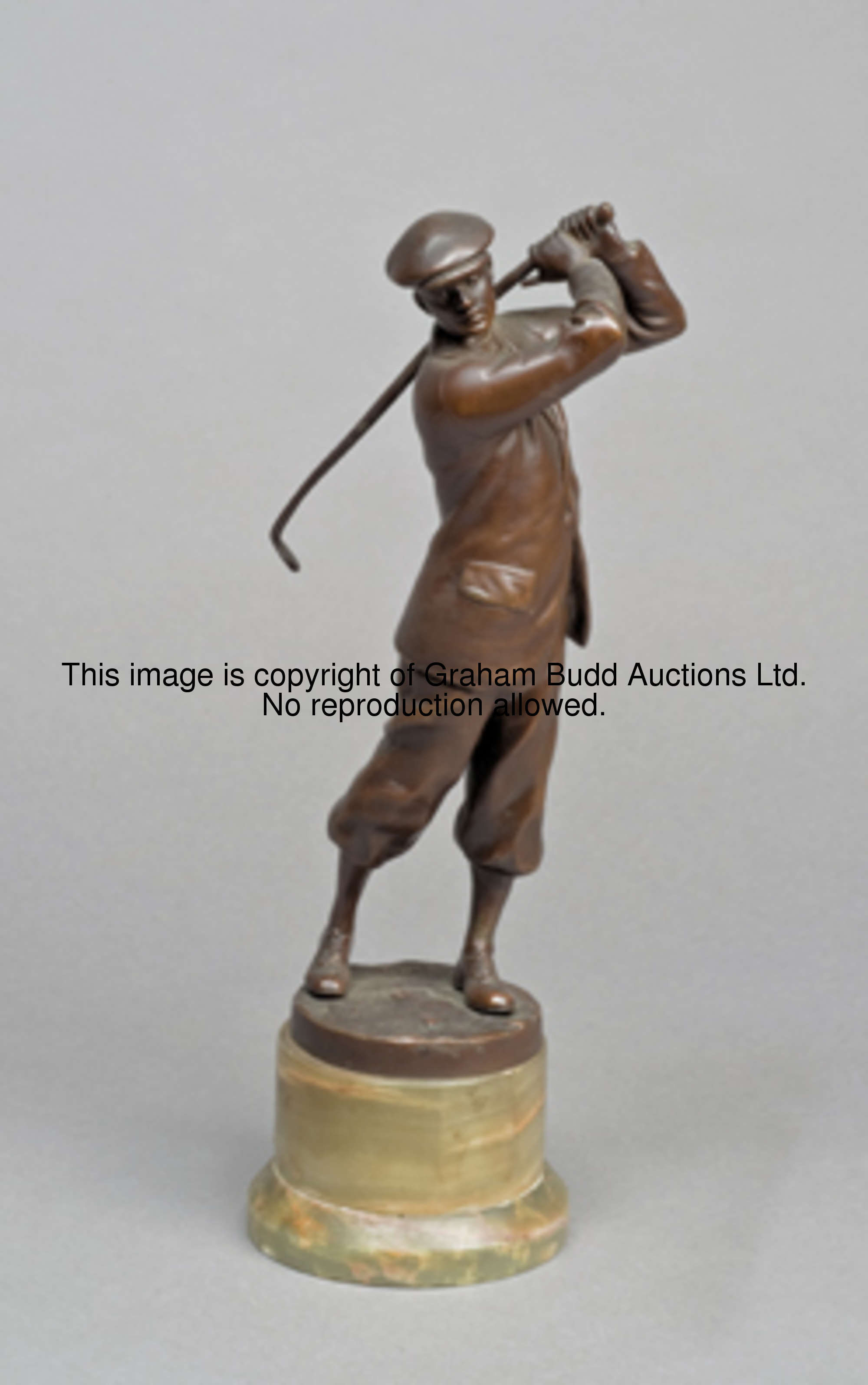 An Austrian bronze figure of a gentleman golfer, signed R. Thuss, and stamped ARGENTOR - VIENNA, ric...