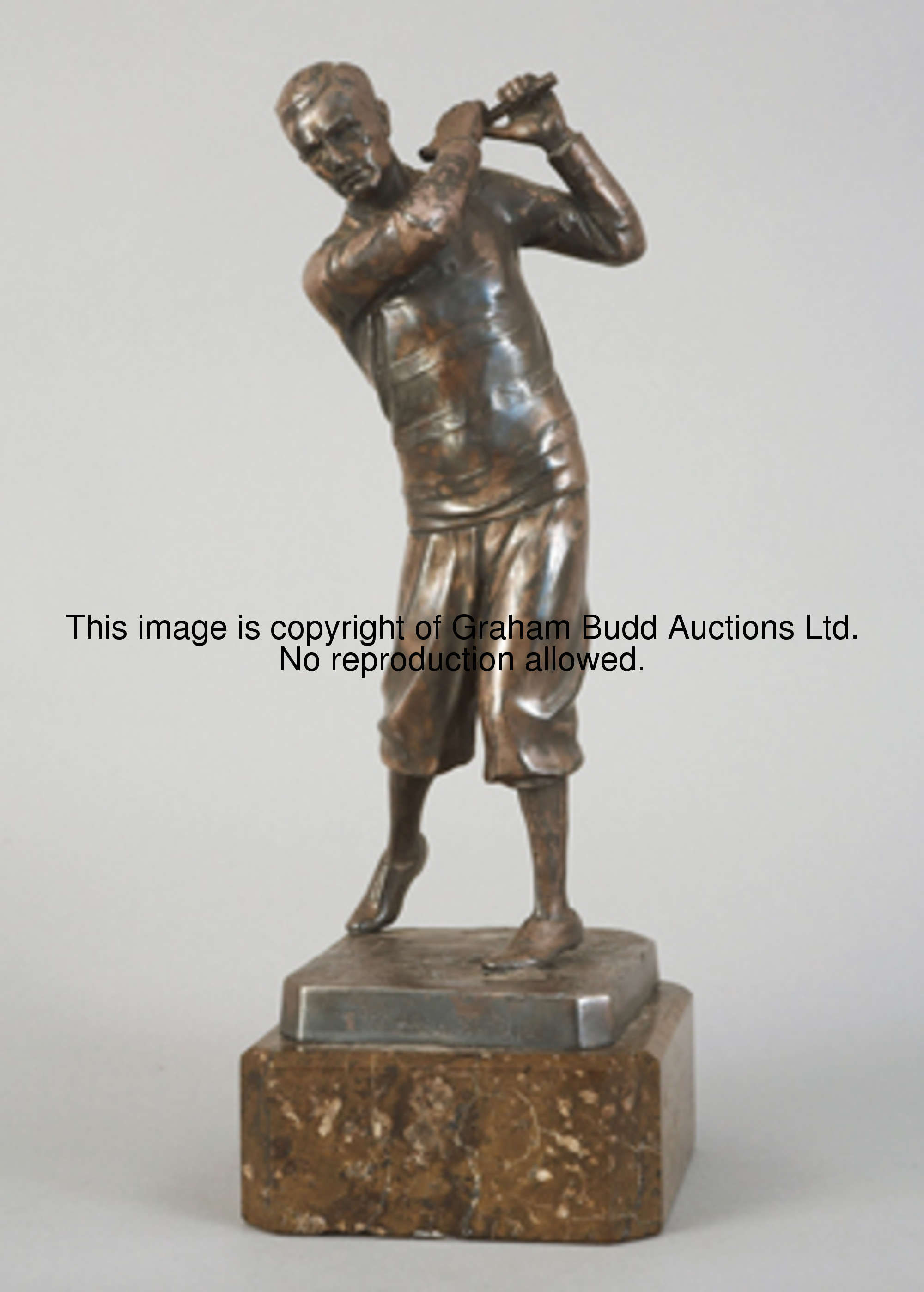 W* Zwick GOLFER signed on the square base, spelter figure with a silvered patina, mounted on a marbl...