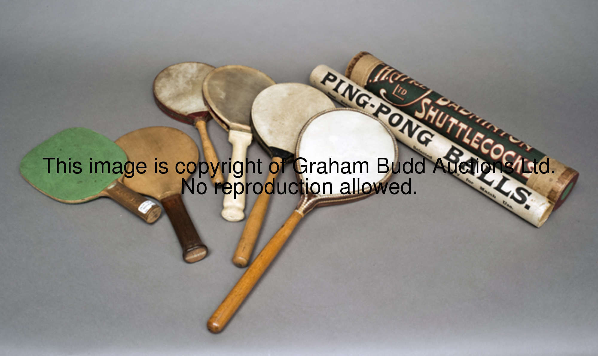 Vintage table tennis equipment, comprising: an early pair of Jacques bats wood with leather butt cap...