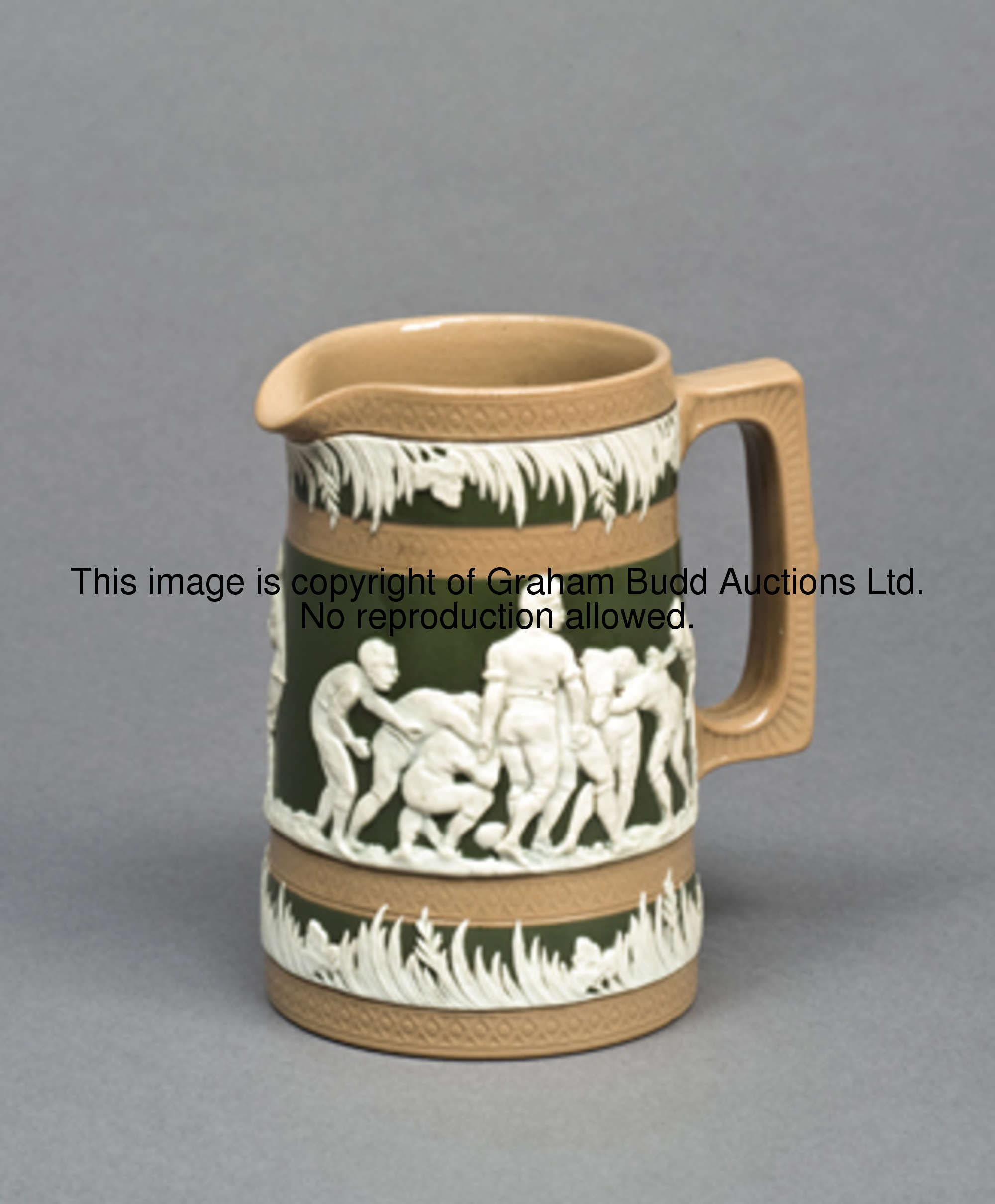 A small Copeland late Spode stoneware jug, with rugby scenes moulded in white raised relief between ...