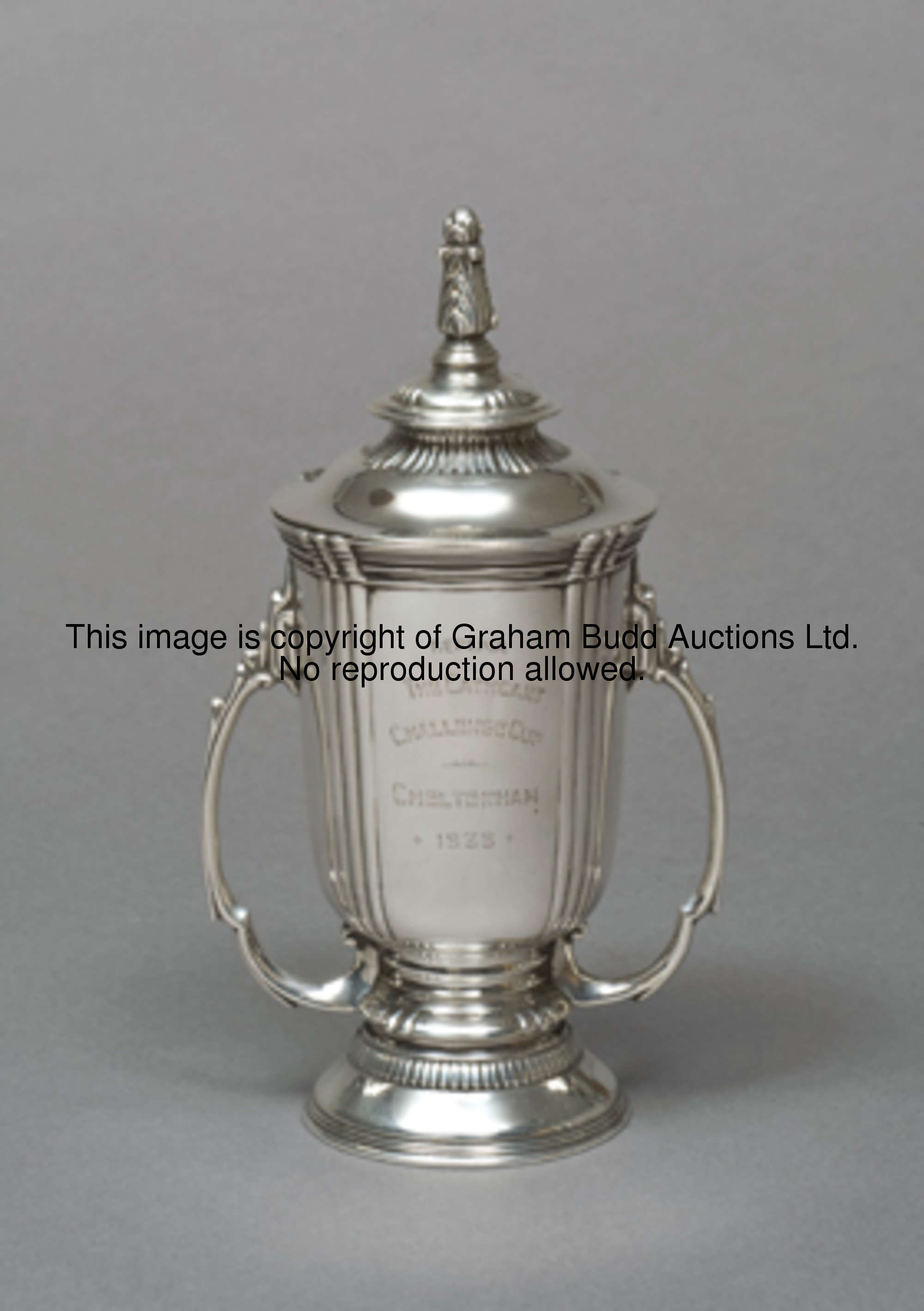 A silver miniature replica of the Cathcart Challenge Cup presented to the owner of the winning horse...