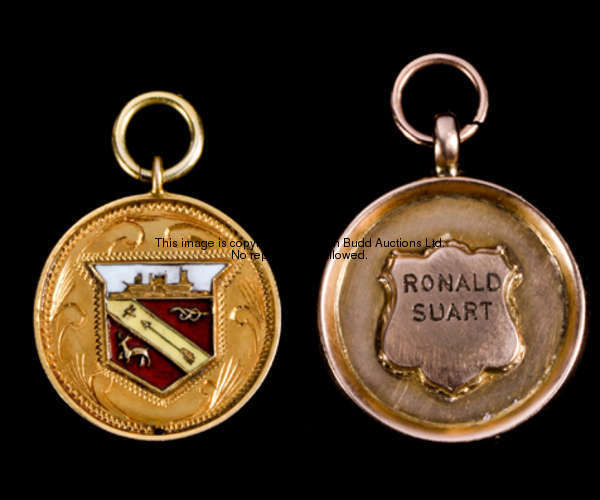 Two junior sporting medals won by Ronald Suart, the first a 9ct. gold medal inscribed RONALD SUART, ...