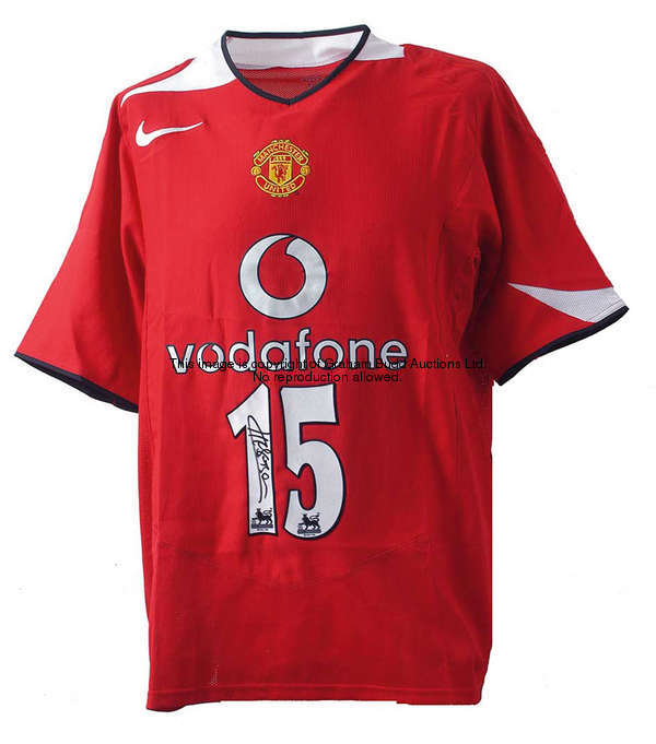 A red Manchester United replica jersey signed by Jose Kleberson, sold with a signed certificate of a...