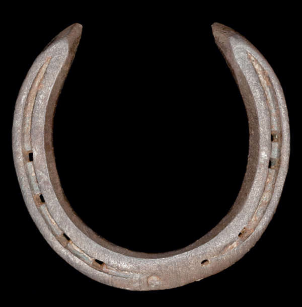 A Red Rum horse shoe certified by Ginger McCain, the iron general purpose work shoe sold together wi...