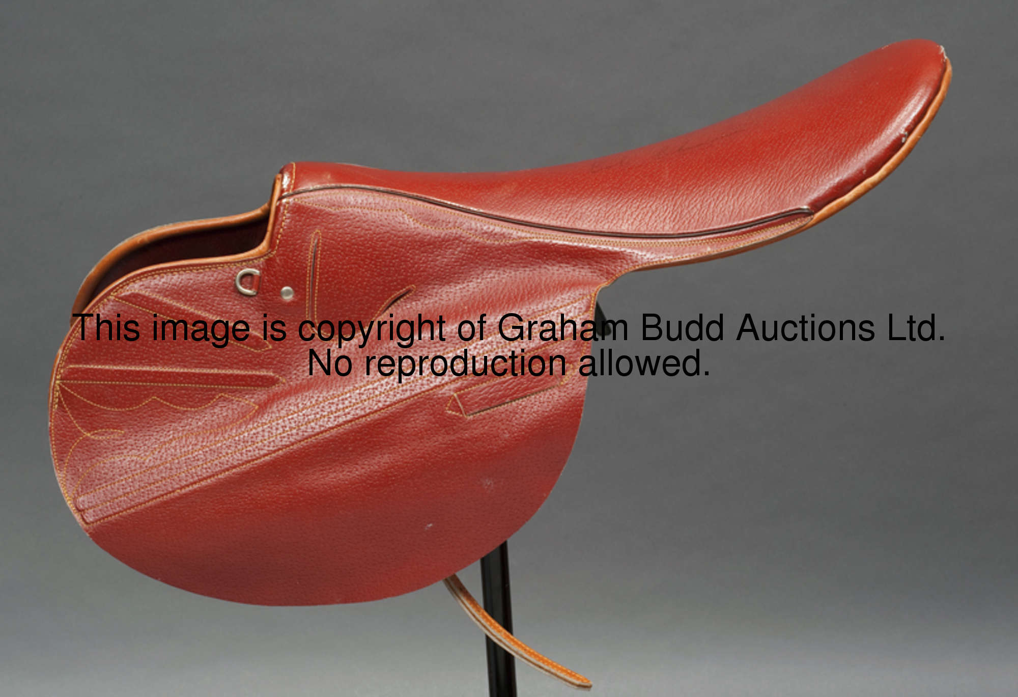 A signed Bob Champion racing saddle, by Syd Hill of Brisbane, Australia, in tan leather with patent ...