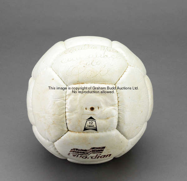 A white leather football signed by Pele, signature in ink with a dedication