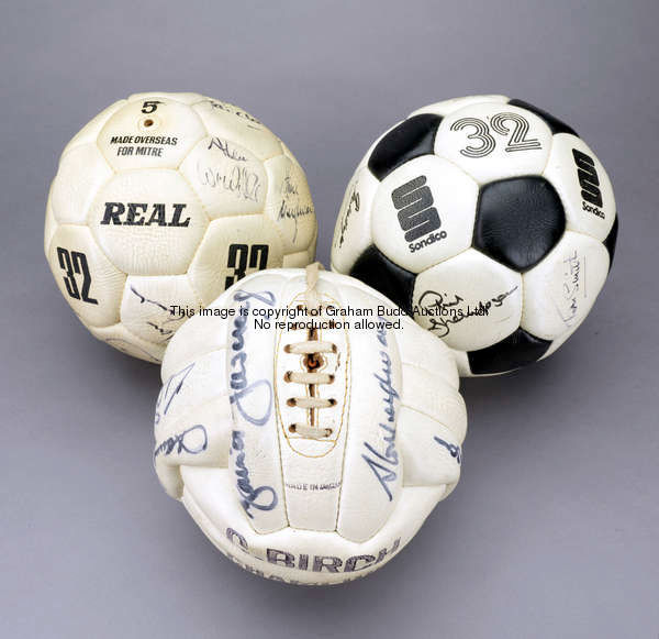 A trio of signed Liverpool footballs signed by teams from the Bob Paisley era