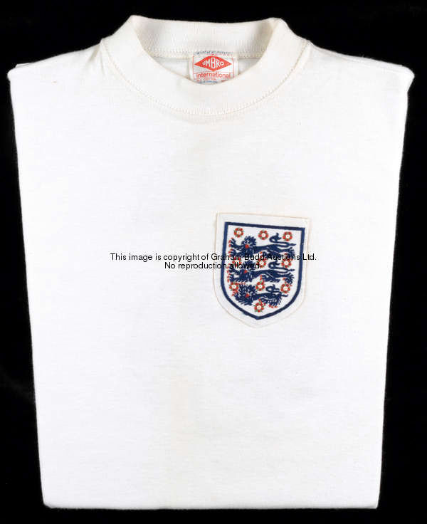 Bobby Moore: a white England No.6 international jersey early 1970s, red Umbro international label, l...