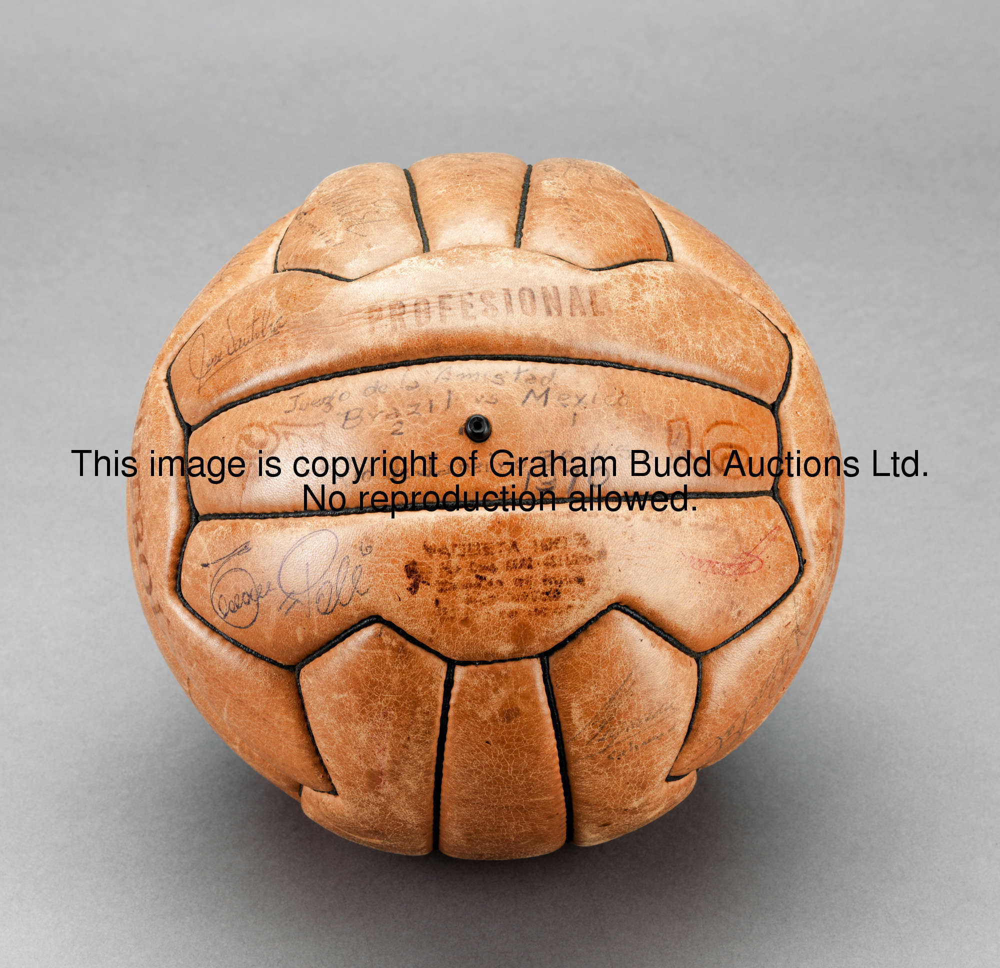 A leather football signed on the occasion of the Brazil v Mexico international match 30th September ...