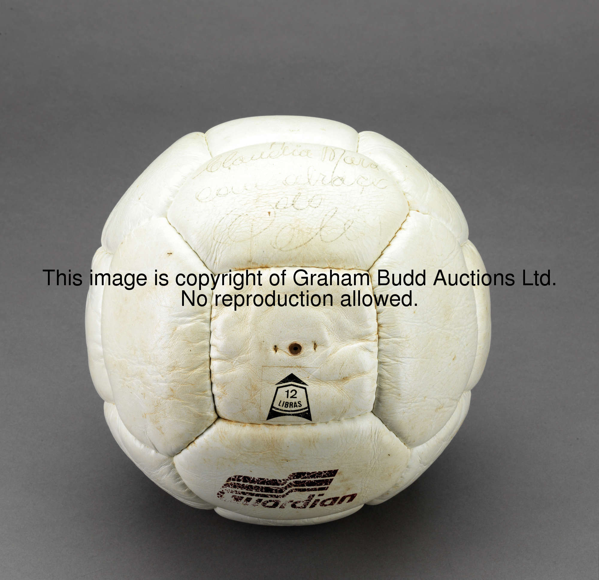 A white leather football signed by Pele, signature in ink with a dedication