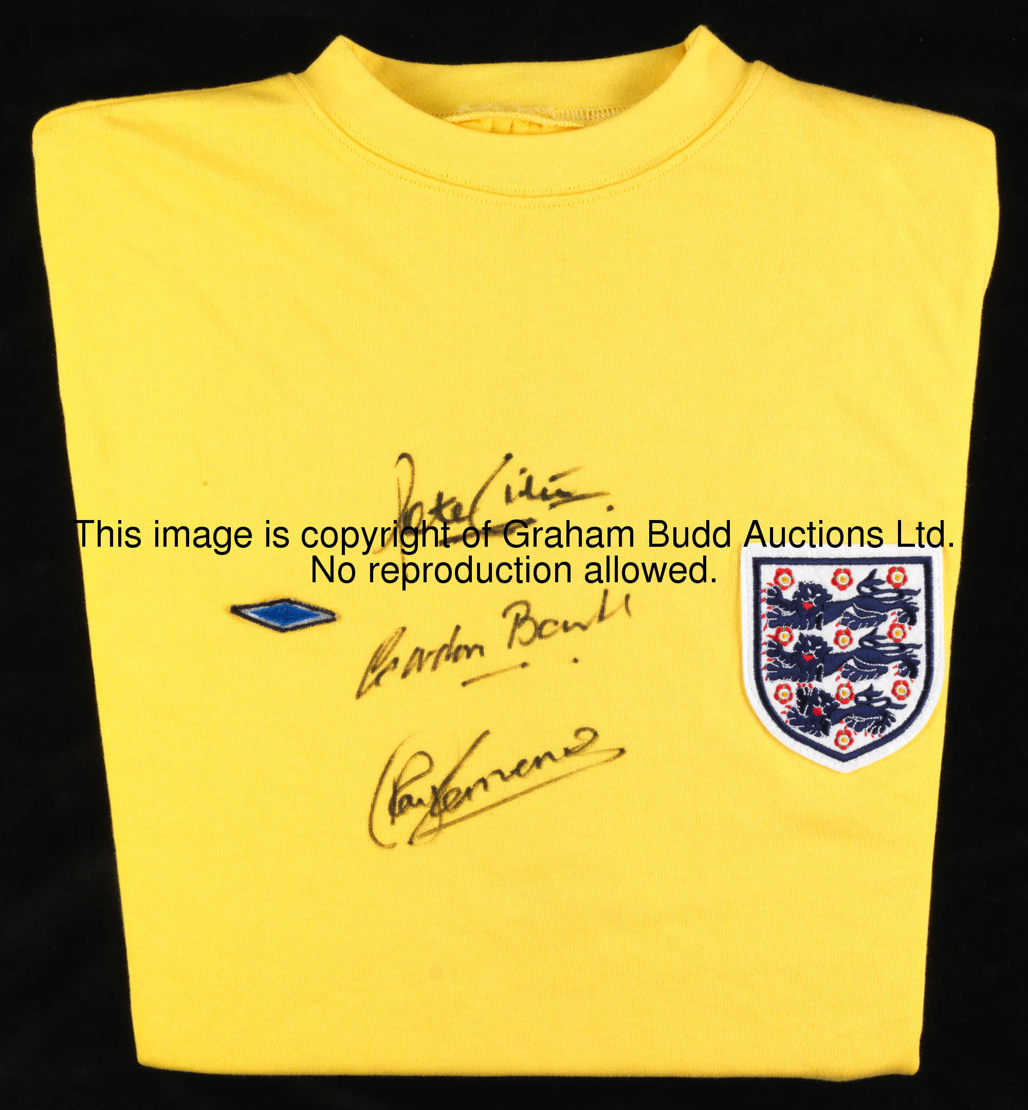 A yellow retro England goalkeeping jersey signed by Gordon Banks Ray Clemence & Peter Shilton, signa...