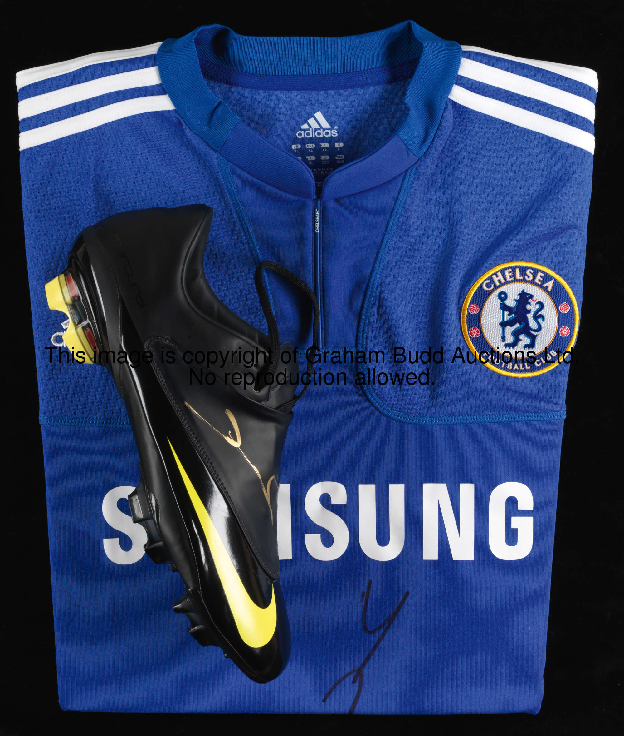A boot and jersey signed by Didier Drogba, a black & yellow Nike Mercurial Vapor right boot signed i...