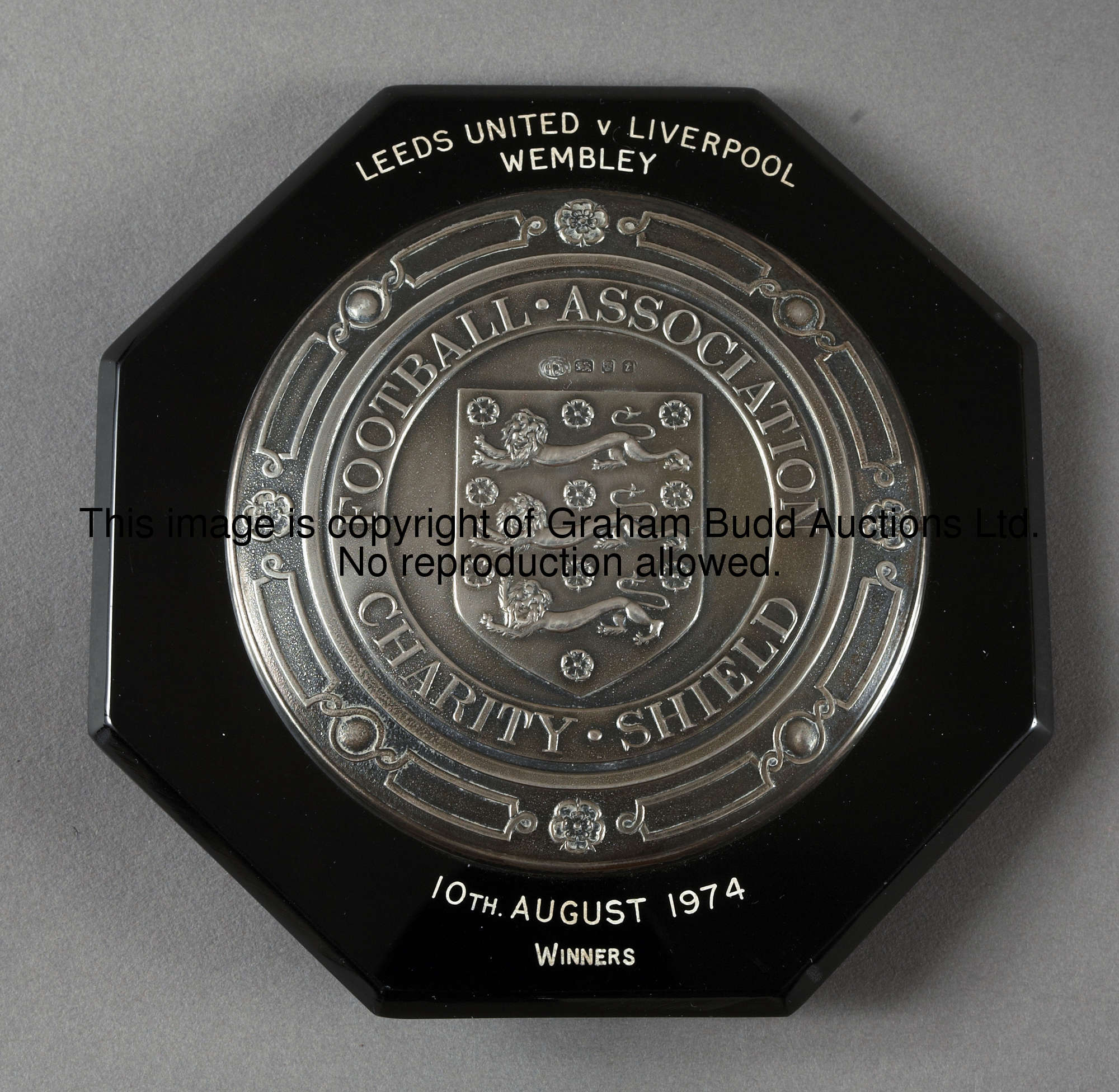 Alec Lindsay's silver miniature replica of the 1974 F.A. Charity Shield, inscribed FOOTBALL ASSOCIAT...