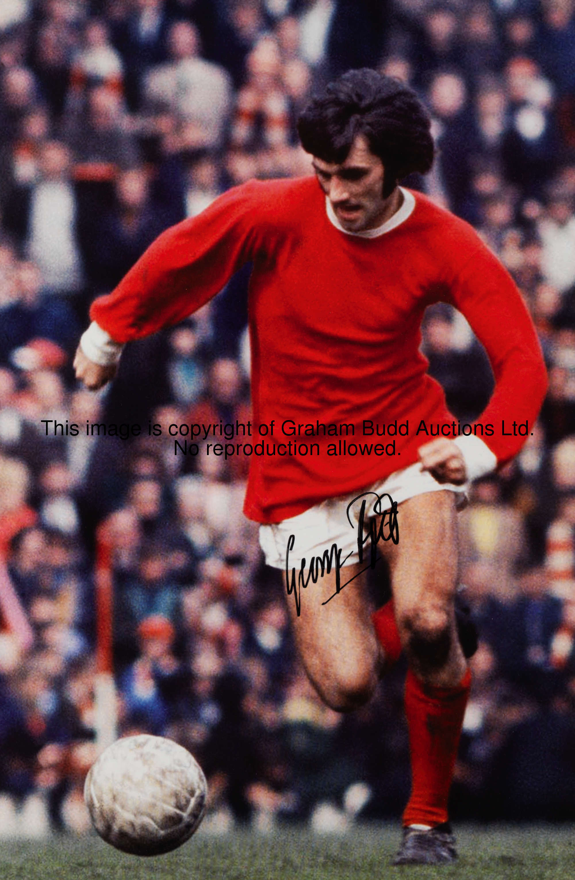 A signed 19 by 12in. colour photograph of George Best, portrayed in action for Manchester United, si...