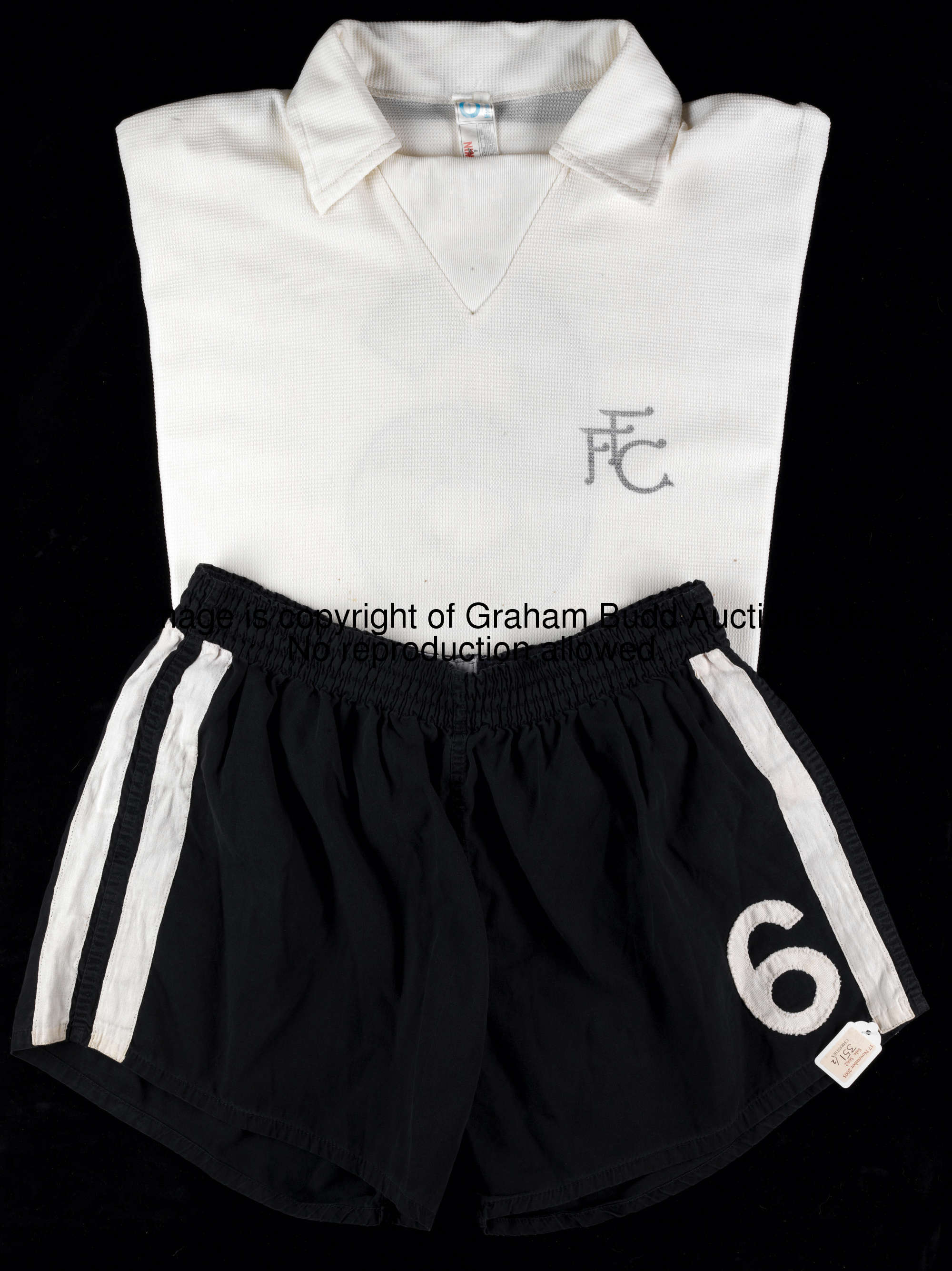 Bobby Moore: a white Fulham No.6 jersey and a pair of black No.6 shorts, long-sleeved jersey with pr...