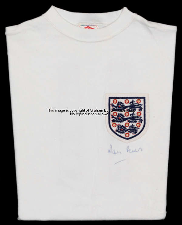 Martin Peters: a signed white England No.11 jersey early 1970s, signed by Martin Peters beneath the ...