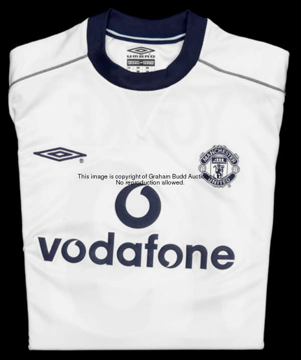 Dwight Yorke: a white Manchester United No.19 Champions League away jersey season 2000-01, long-slee...