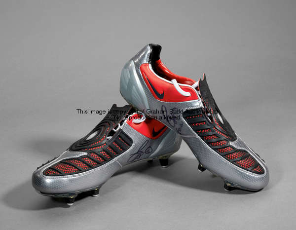 Michael Essien: a signed pair of football boots, silver, black & red Nike Total Ninety boots inscrib...