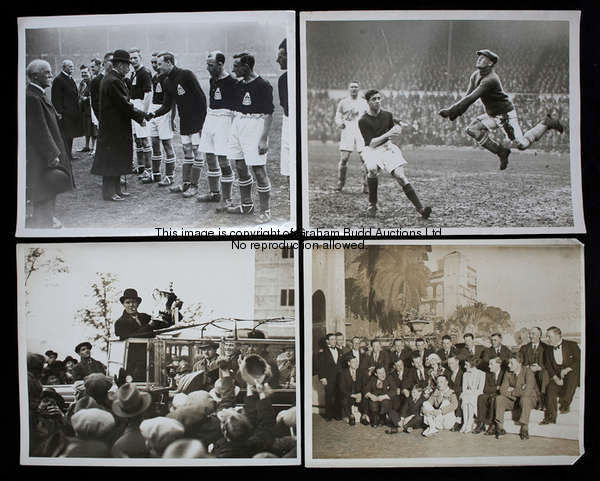 An original 10 by 8in. sepia-toned press photograph of the Blackburn Rovers team showing the F.A. Cu...