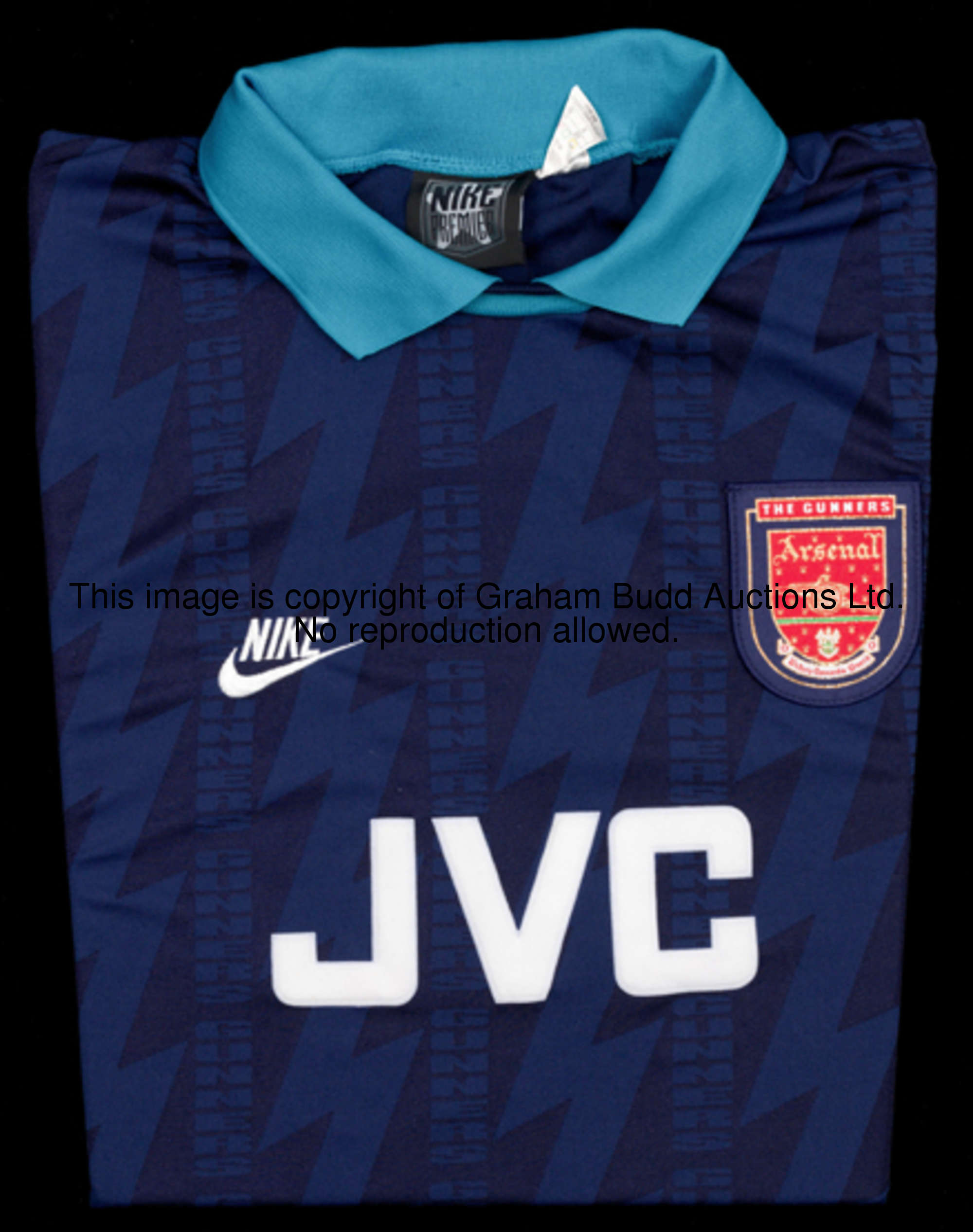 Paul Davis: a blue Arsenal No.4 away jersey season 1994-95, long-sleeved, F.A. Premier League flashe...