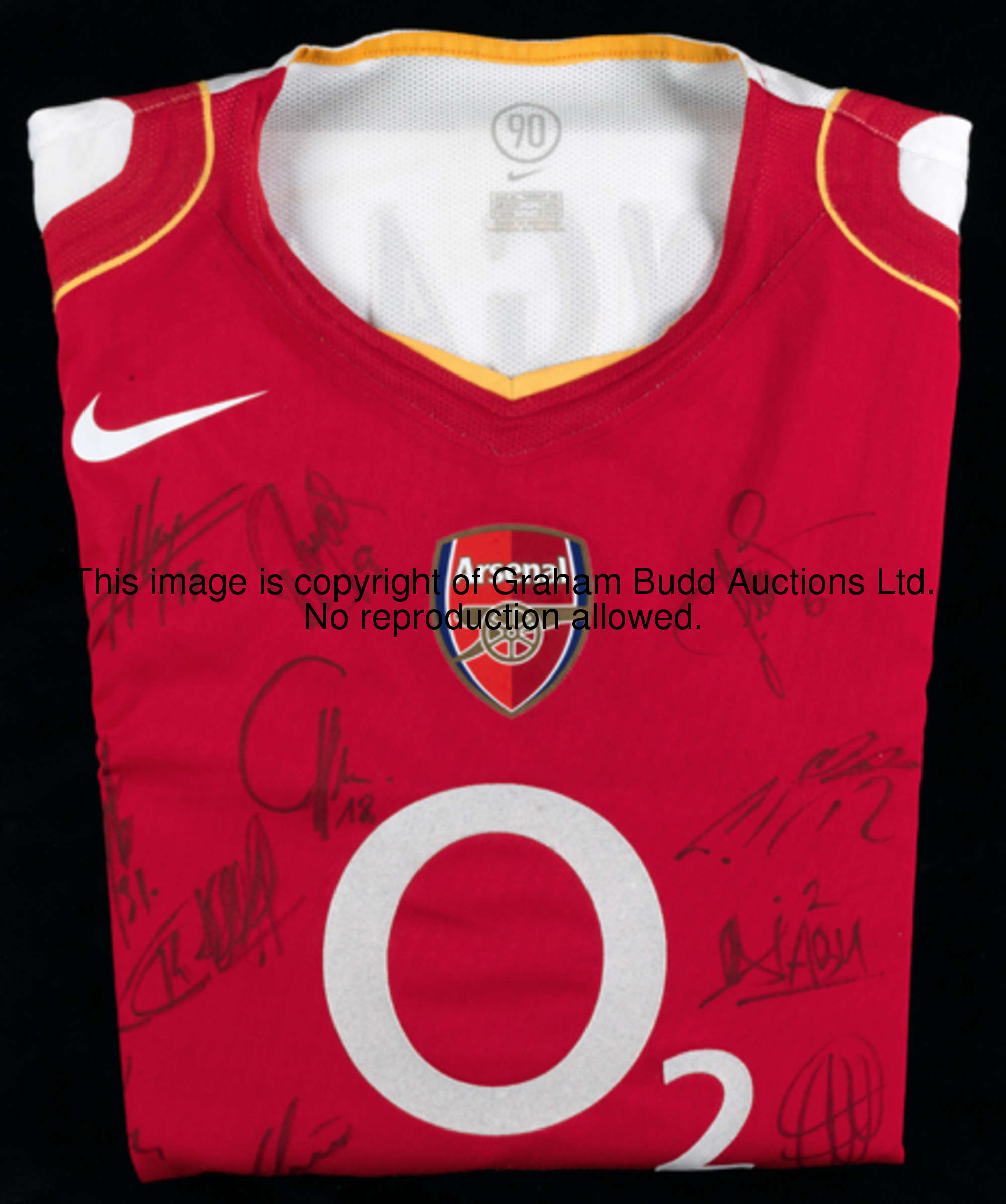 A group of three Pascal Cygan Arsenal No.18 jerseys, a red, a blue and a redcurrant issue, the first...