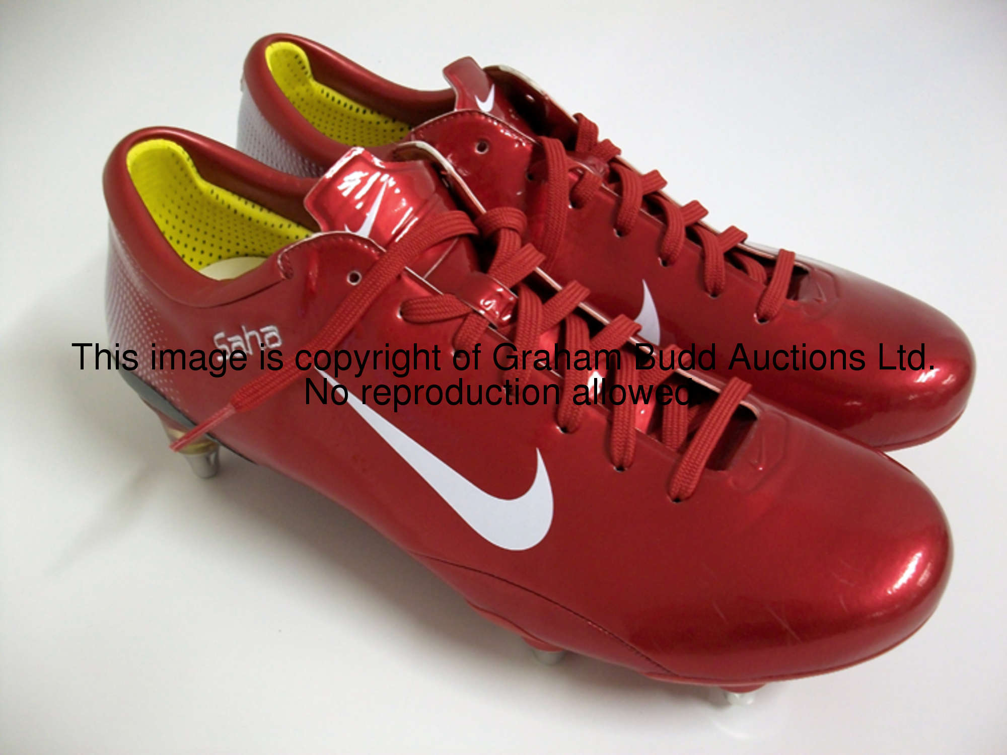 Louis Saha: a pair of football boots, red Nike MV boots, each inscribed SAHA     Provenance: The San...
