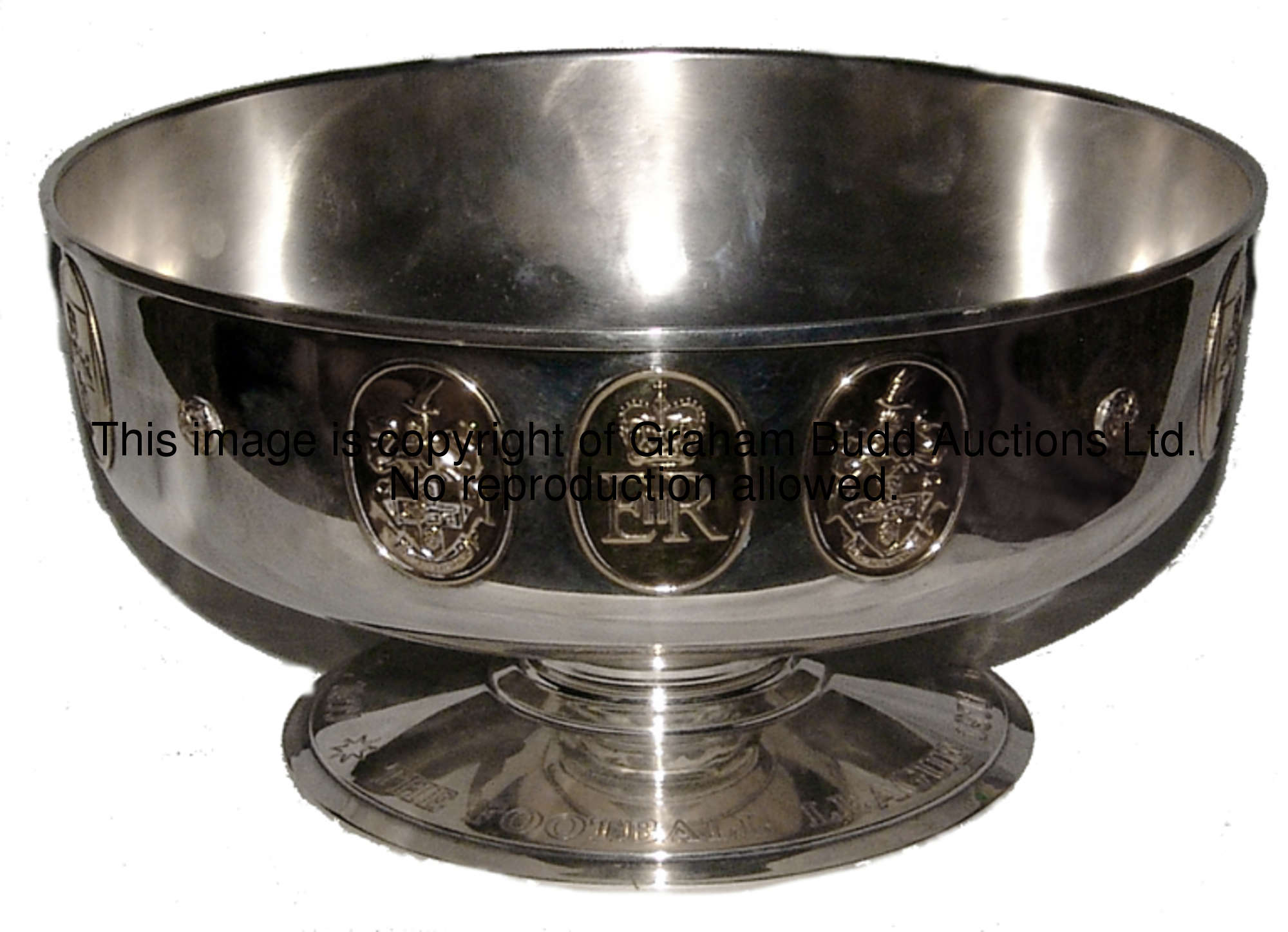 A silver bowl commissioned by the Football League to commemorate the Silver Jubilee of H.M. Queen El...