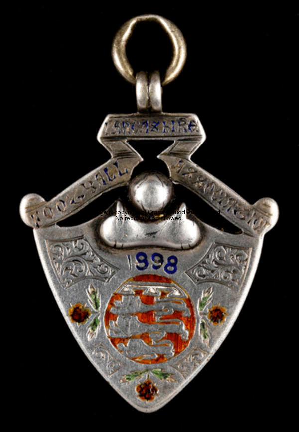 A silver & enamel Lancashire Football Association Senior Cup runners-up medal 1898 awarded to P. Cha...