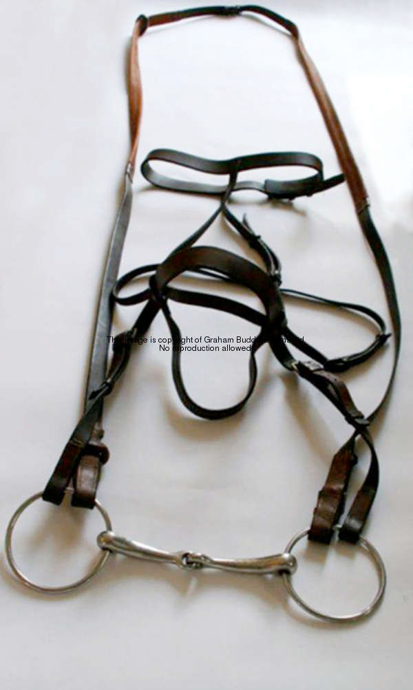 The Arkle Bridle, an authenticated bridle fixed with original reins worn by Arkle in some of his rac...