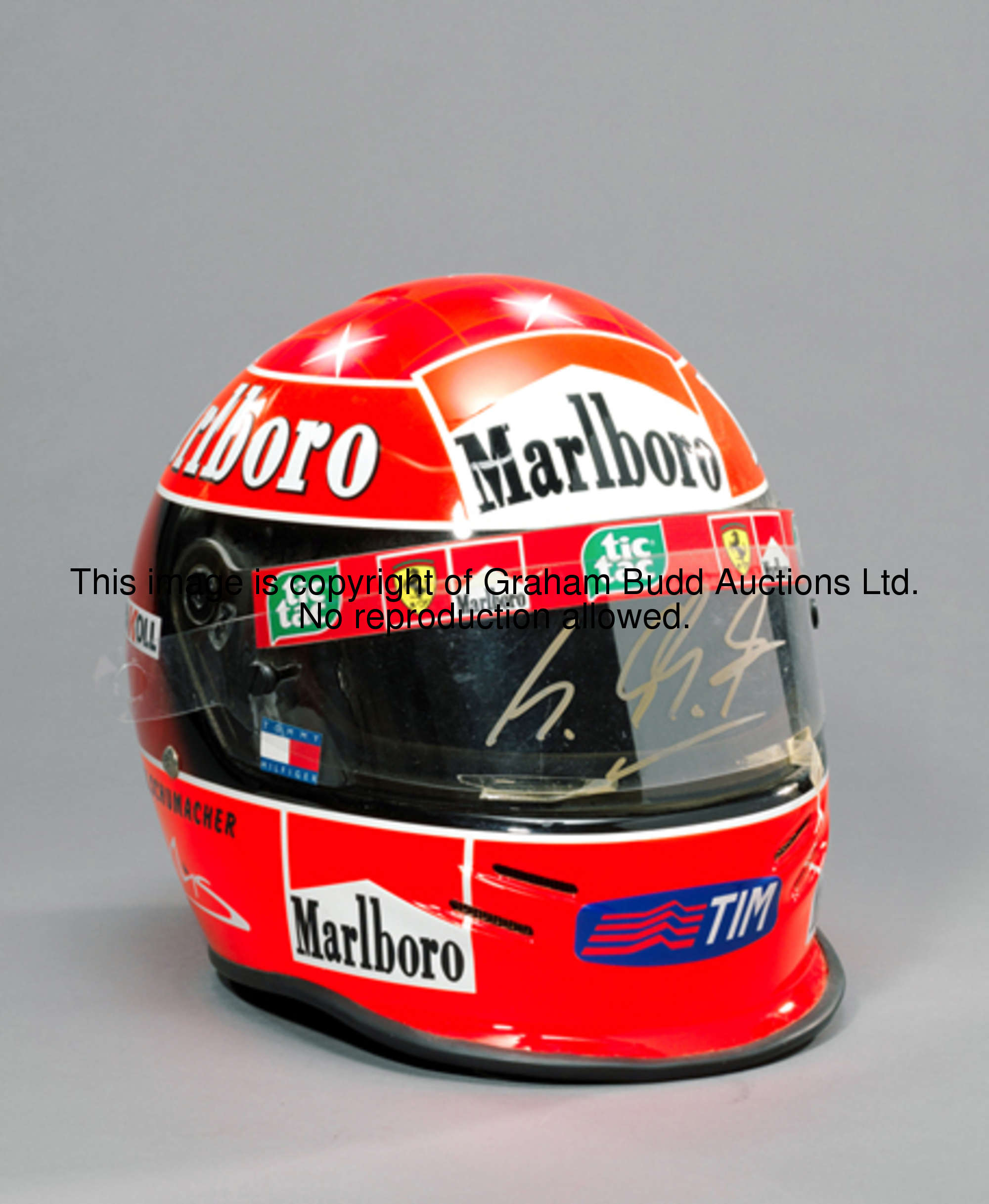 2001 Michael Schumacher-signed Marlboro F1 replica Bell helmet, his signature in gold marker pen on ...