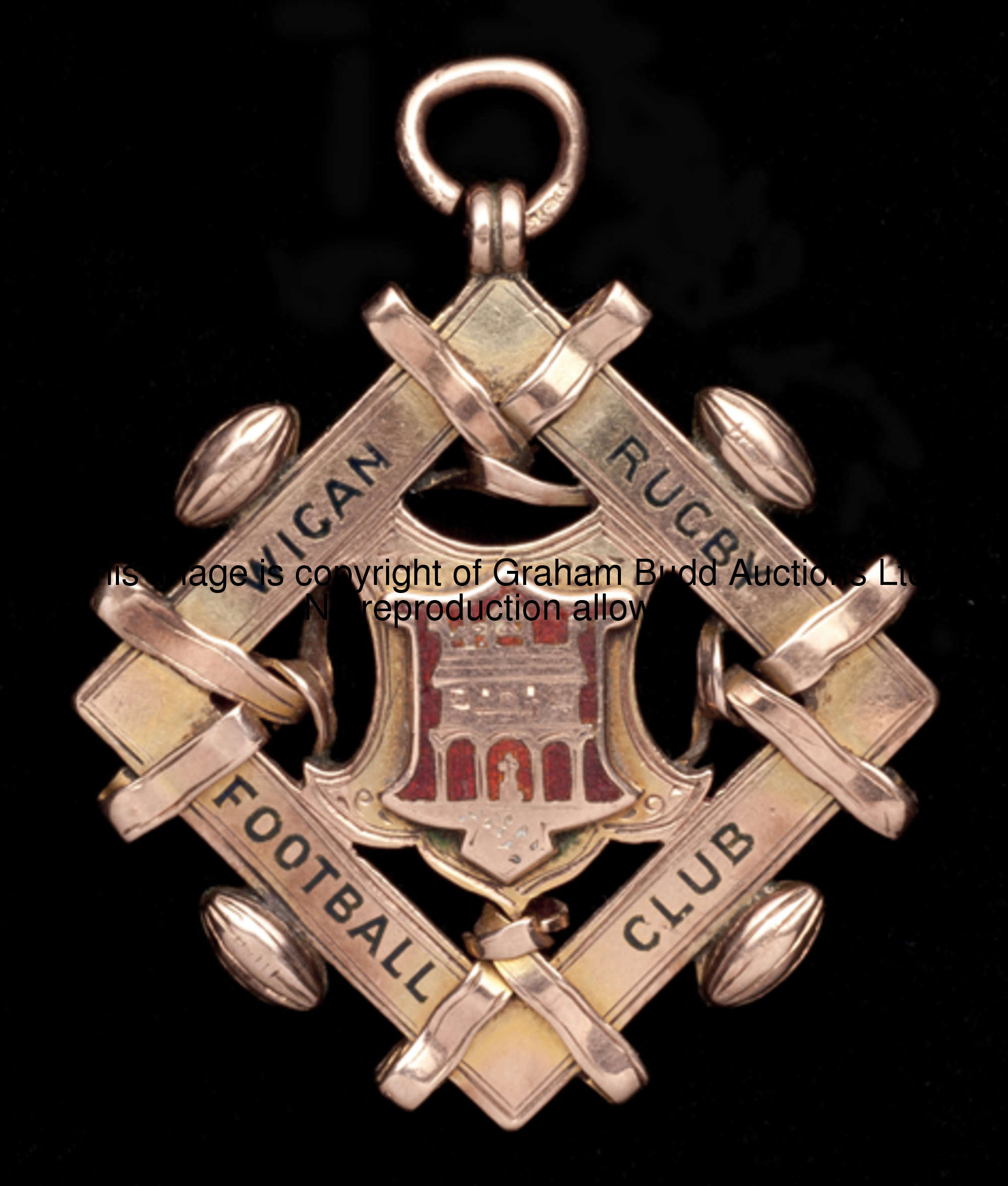 A 9ct. gold & enamel Wigan RFC medal commemorating the club's victory over the New Zealand Rugby lea...