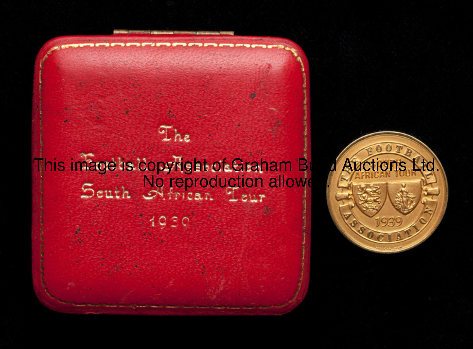 The 14ct. gold medal presented to Jim Lewis's father J.W. Lewis by the Football Association for his ...