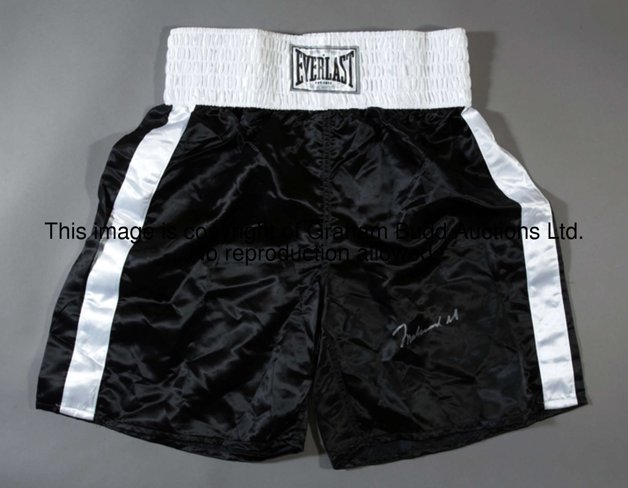 Muhammad Ali signed boxing trunks, black Everlast, signed in silver marker  This signature was obtai...