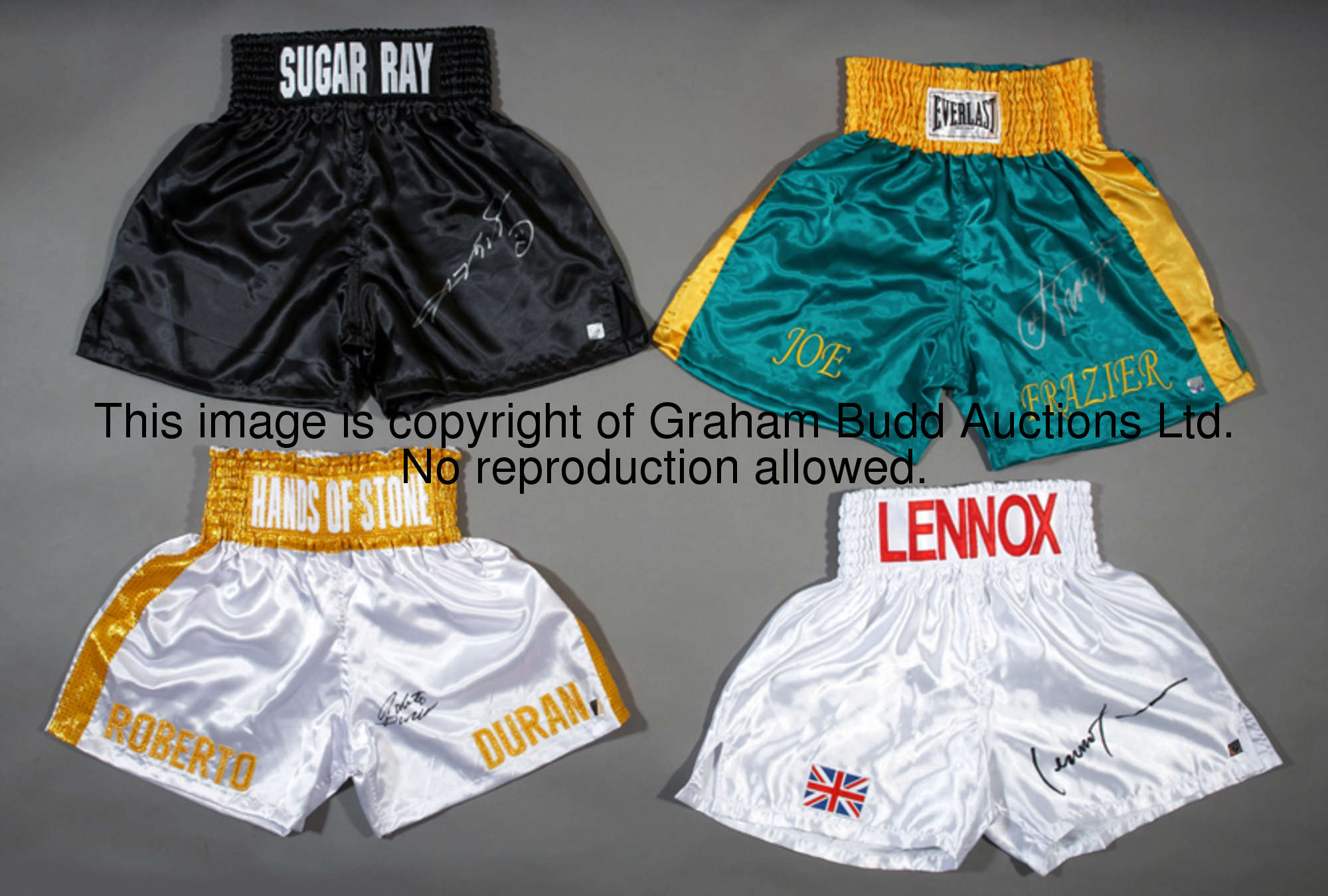 A group of four signed replica boxing trunks, subjects comprising: Joe Frazier, Sugar Ray Leonard, R...